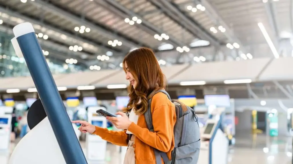 customer using self service kiosk